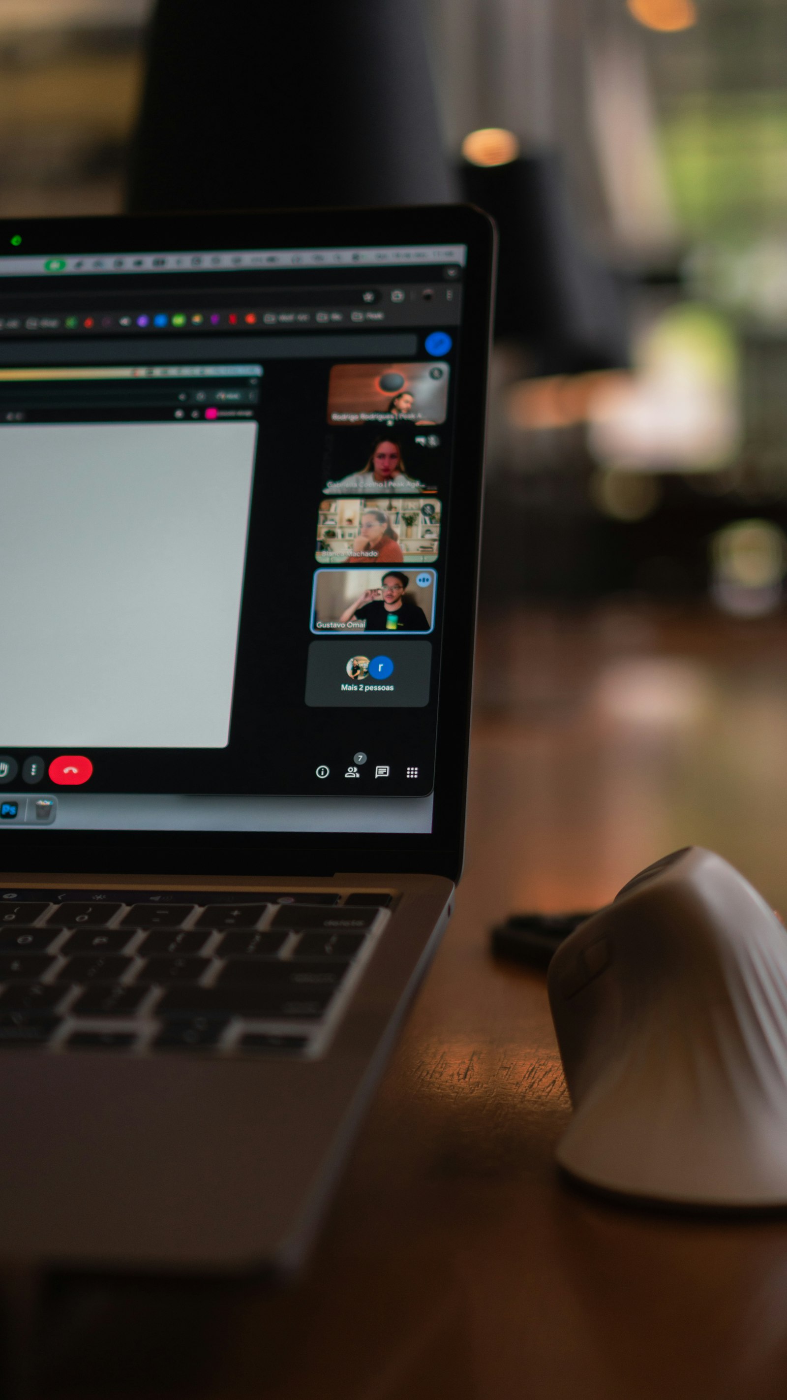 Laptop screen showing a remote team video call